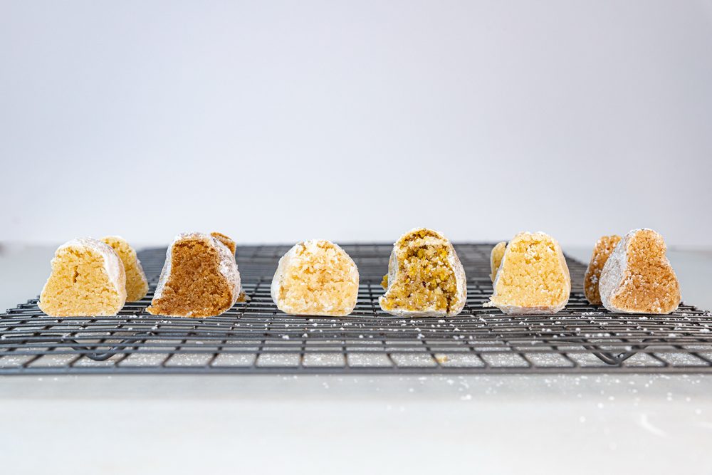 Pizzicotti cookies cut open, showing all flavors